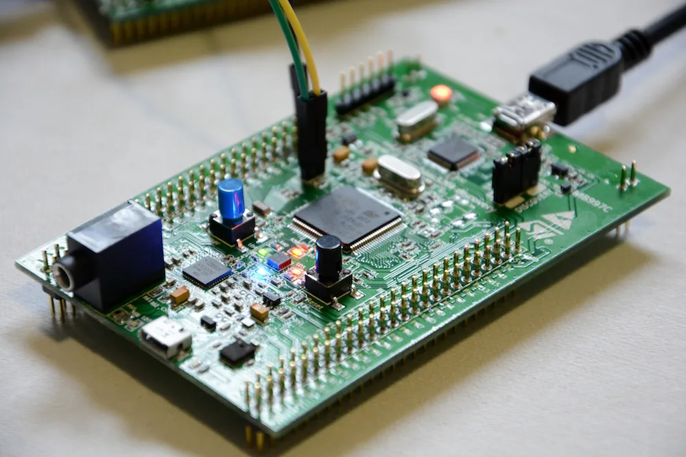 It denotes the general family of planar, sometimes flexible, non-conductive materials with conductive traces adhering to it and holes penetrating it that interconnect the components